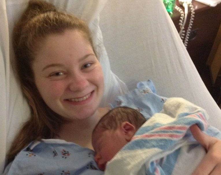 14-year-old-Mother-happy-with-newborn