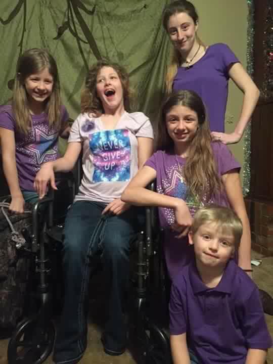 Searcy family portrait with wheelchair