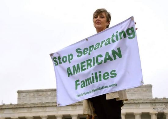 Connie with Separating American Families sign