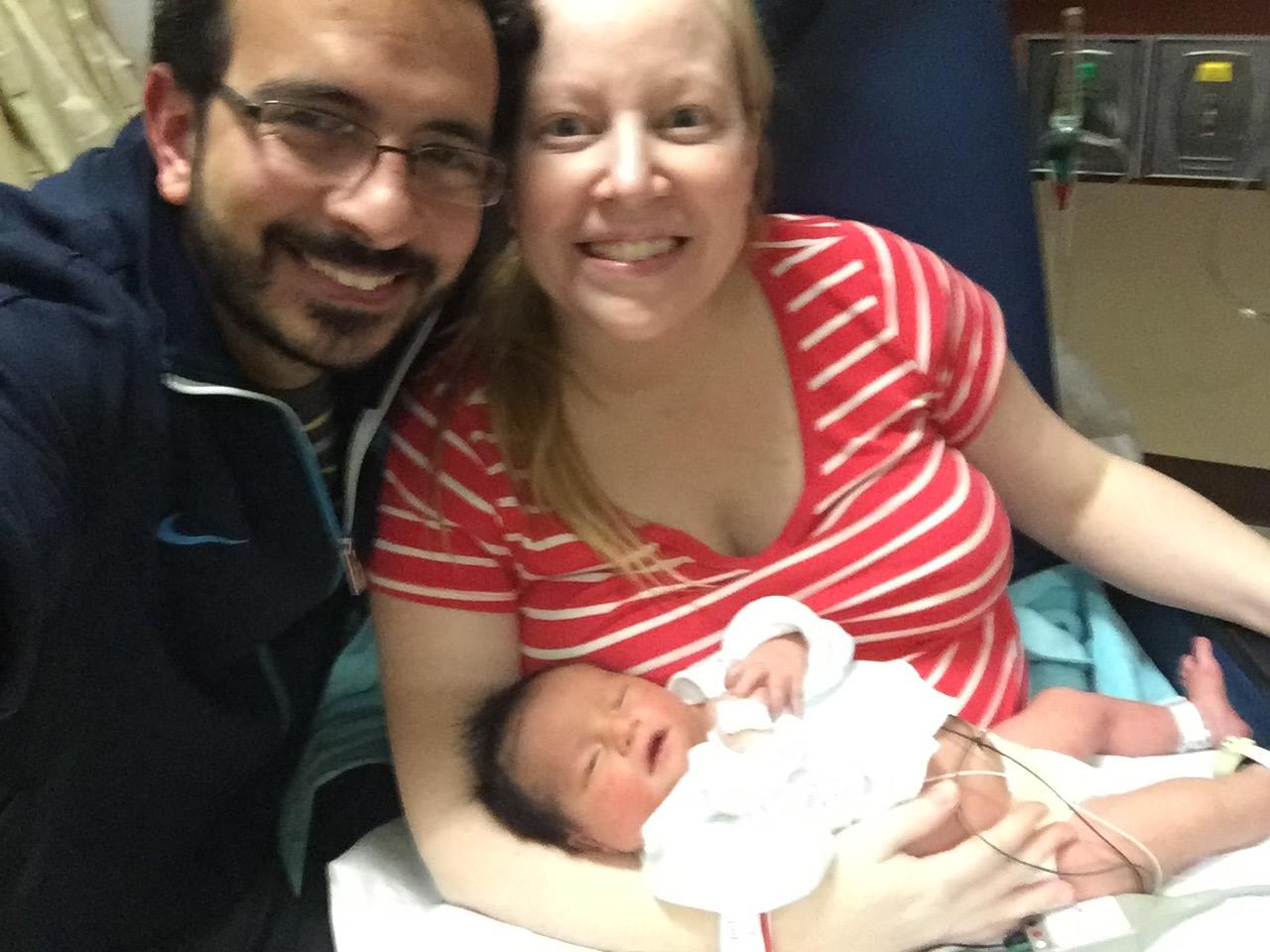 parents with baby 4
