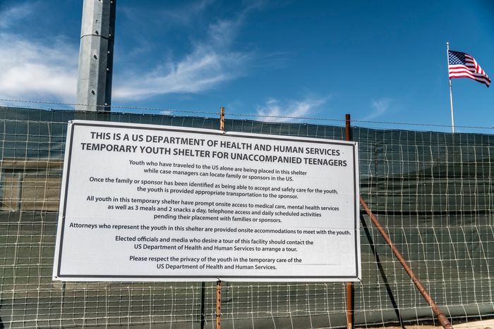 A sign outside of an Influx Care Facility (ICF) for unaccompanied children in Carrizo Springs, Texas. Photo: Sergio Flores/The Washington Post via Getty Images. Image source.